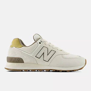 Off-white sneaker with an "N" logo, a suede heel panel, brown accents, and a gum sole.