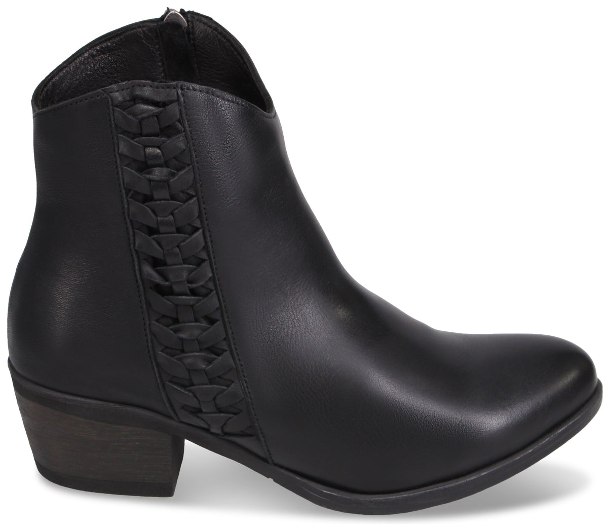 A black ankle boot with a smooth, synthetic upper featuring a vertical woven-look panel along the side, a low-profile block heel in a dark wood finish, and a side zipper closure.