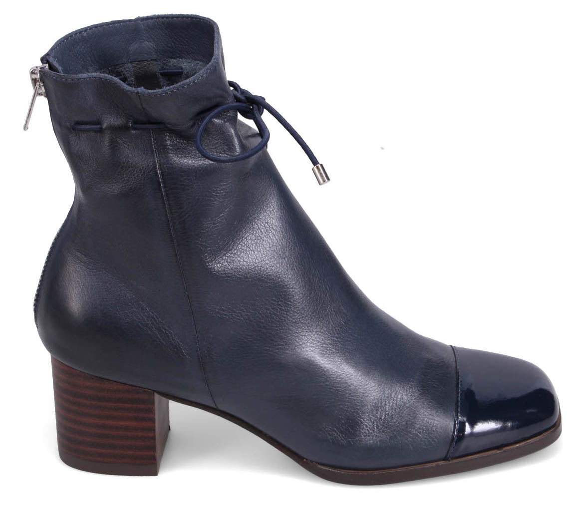 Blue leather ankle boot with a square toe, block heel, and drawstring top.