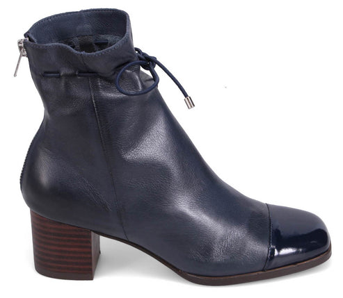 Blue leather ankle boot with a square toe, block heel, and drawstring top.