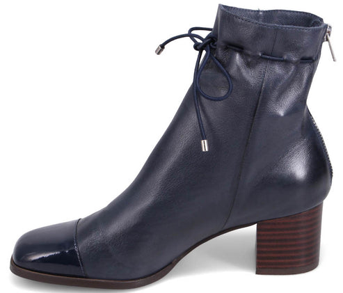 Navy leather ankle boot with a square toe, a block heel, and a rear drawstring.