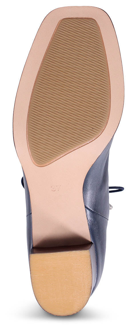 Sole of a dress shoe.