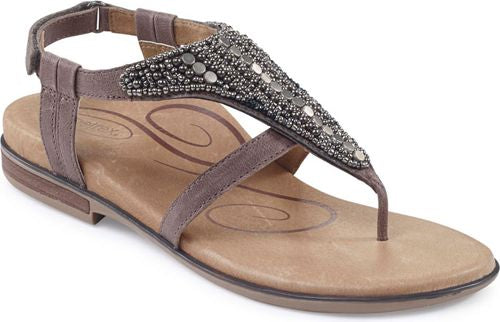 A thong sandal with beaded embellishments and an adjustable ankle strap.