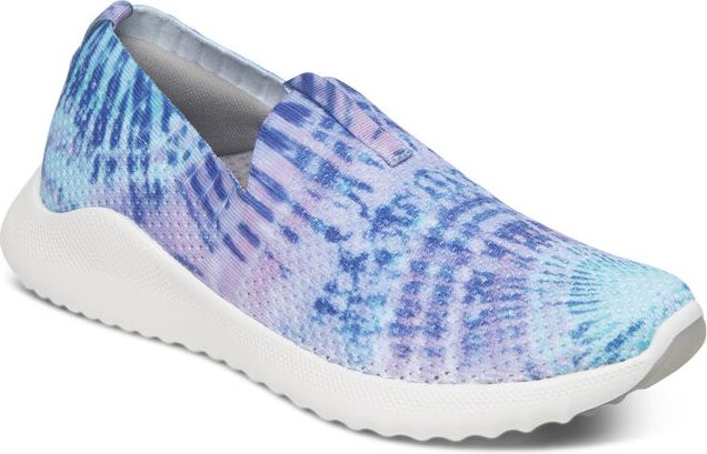Slip-on sneaker with white sole and abstract blue and purple pattern.