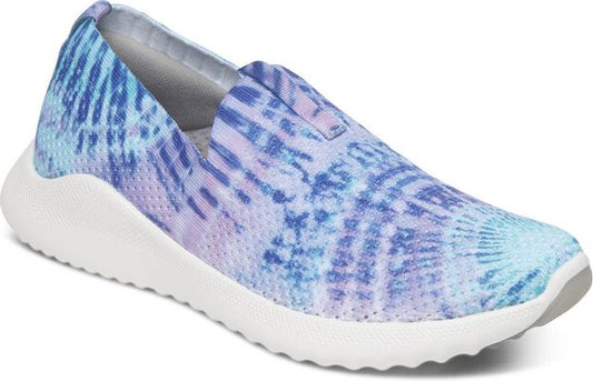 Slip-on sneaker with white sole and abstract blue and purple pattern.