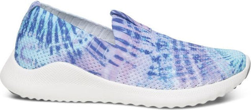 A slip-on shoe with a white sole and a blue and purple tie-dye pattern.