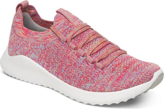 Pink and white knit sneaker with matching laces and a white sole.