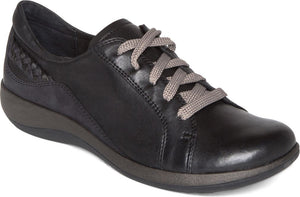 A black leather women's casual sneaker with gray shoelaces and a braided heel.