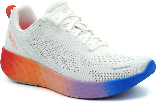 Low top, white athletic shoe with colorful sole fading from red at the heel to blue at the toe.