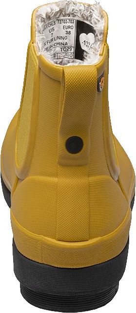 Close-up of a yellow rubber boot with a black sole, featuring a label inside displaying "US 7 EURO 38" and a pull tab with a black snap button at the back.