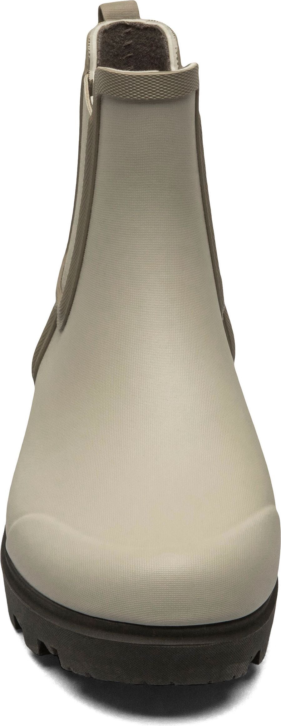 Front view of a beige chelsea boot with a brown sole.