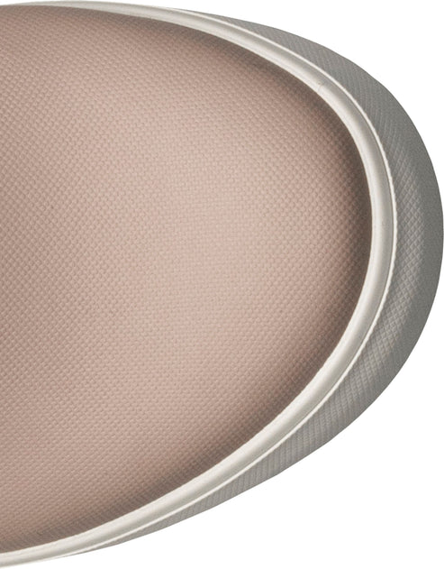 Close-up of a beige eyeshadow pan.