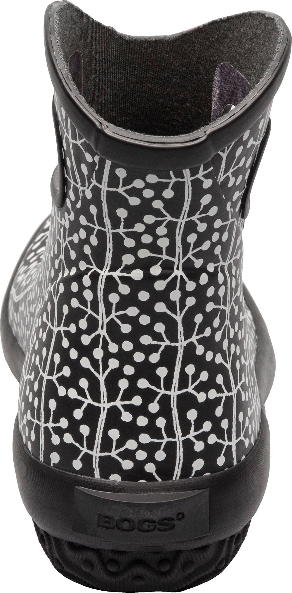 A black and white patterned rain boot with visible 'BOGS' logo.