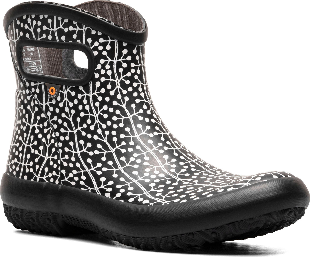 Short black rain boot with white foliage pattern and low heel.