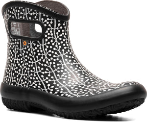 Short black rain boot with white foliage pattern and low heel.