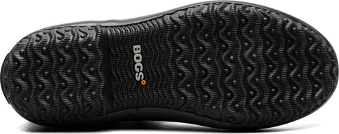The black sole of a shoe has a wave-like tread pattern with small bumps for grip and the word 'BOGS' on the side.