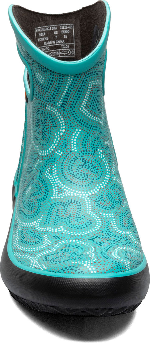 A turquoise and white patterned boot with a black sole.