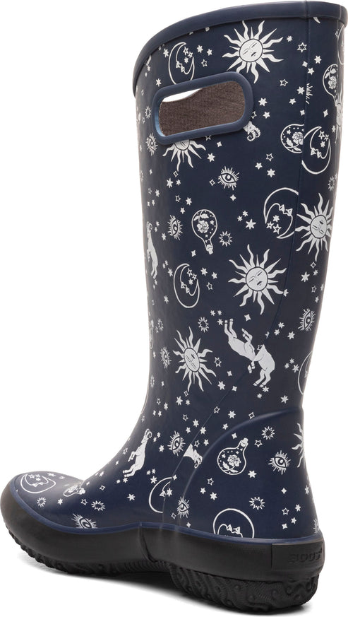 Tall, navy rain boot with white sun, moon, star, and unicorn pattern, with a black sole.