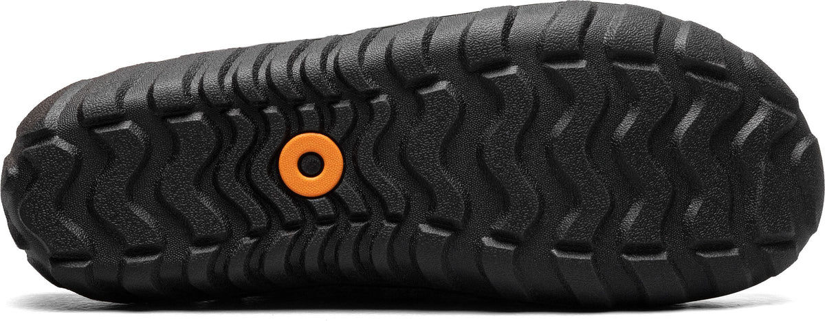 Black lugged sole with orange circle.