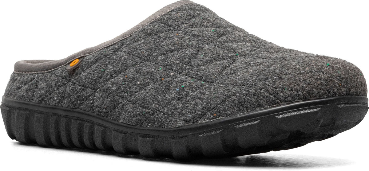 A gray, quilted slipper with a black sole.