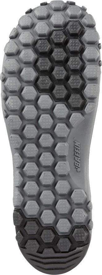A gray shoe sole with a hexagonal pattern.
