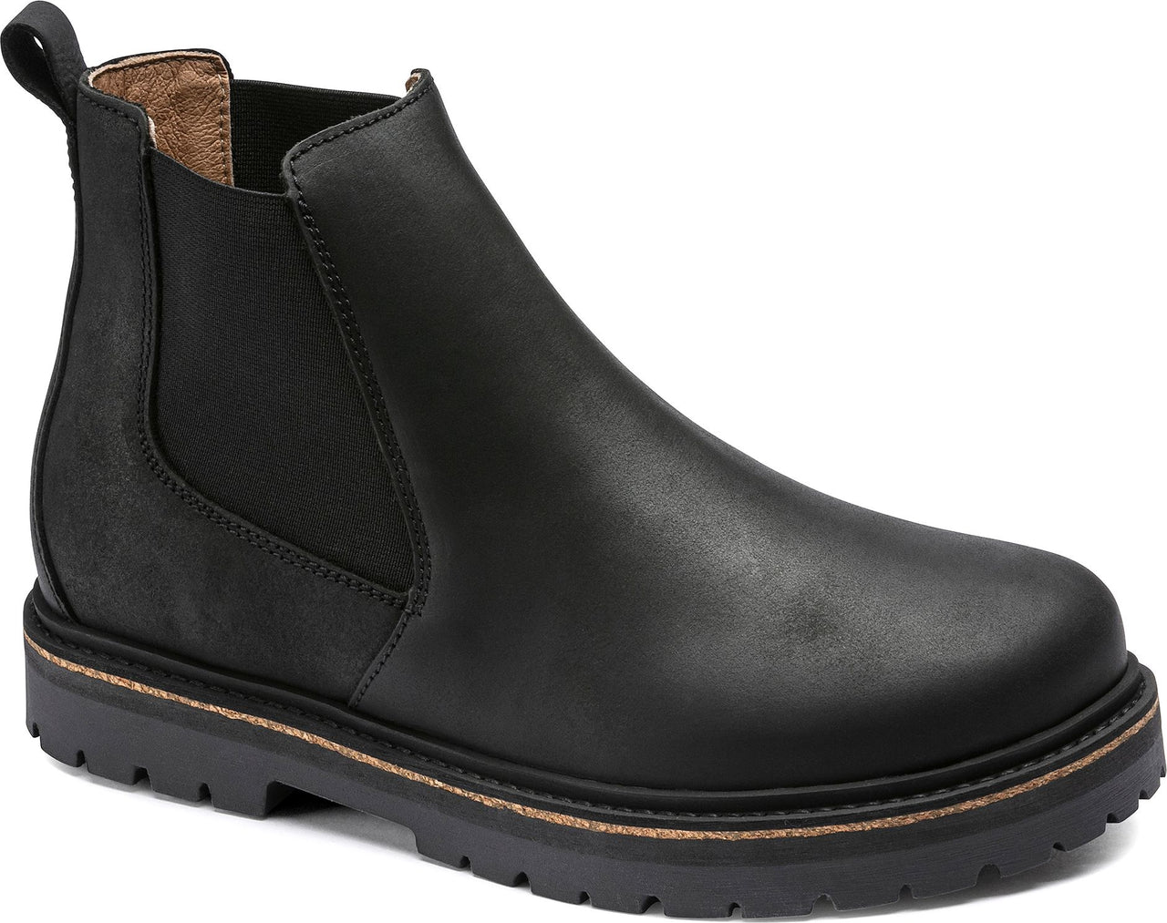 Black leather chelsea boot with lug sole.