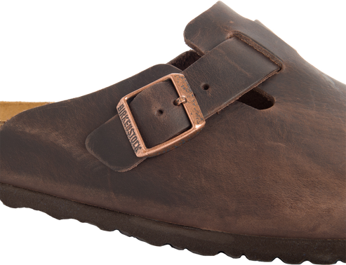 Leather shoe with adjustable buckle; BIRKENSTOCK engraved on the buckle.