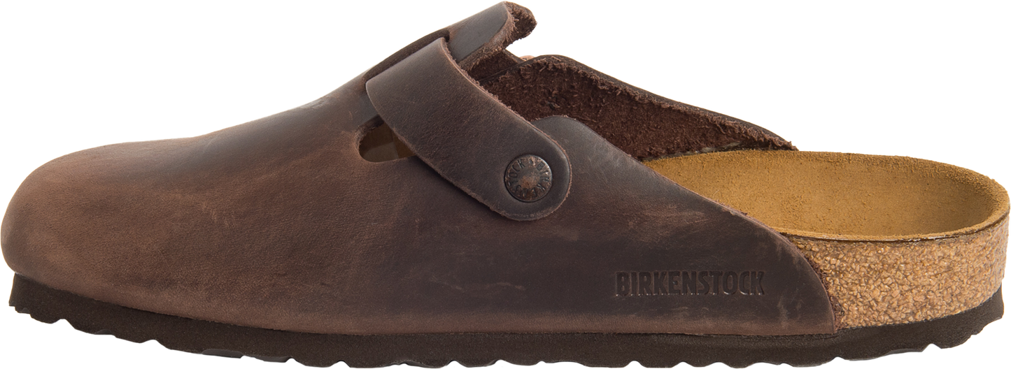 Brown leather clog with adjustable strap and cork sole.