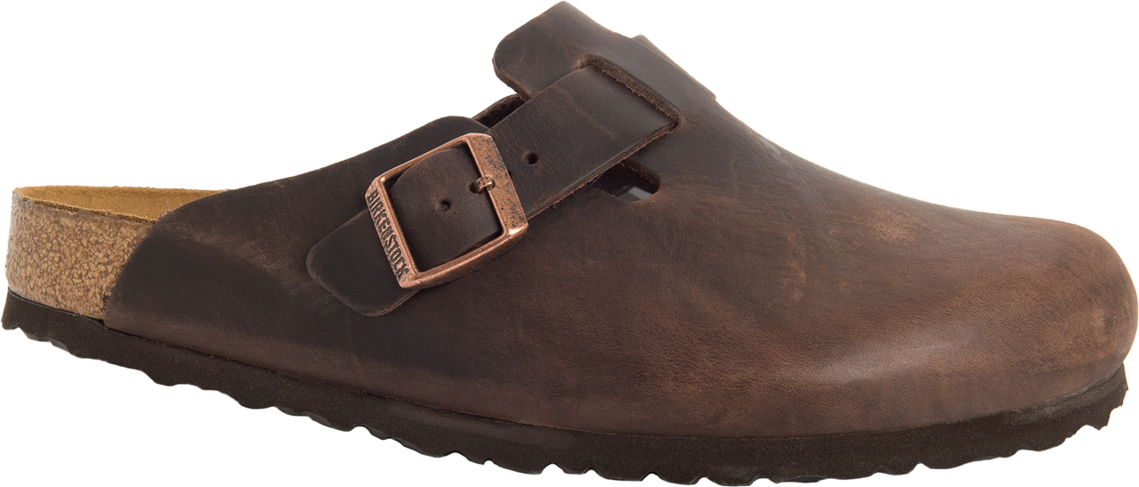 A brown leather clog with a cork footbed and adjustable strap.
