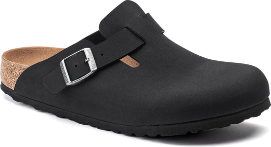 Black clog style shoe with adjustable buckle and cork footbed.
