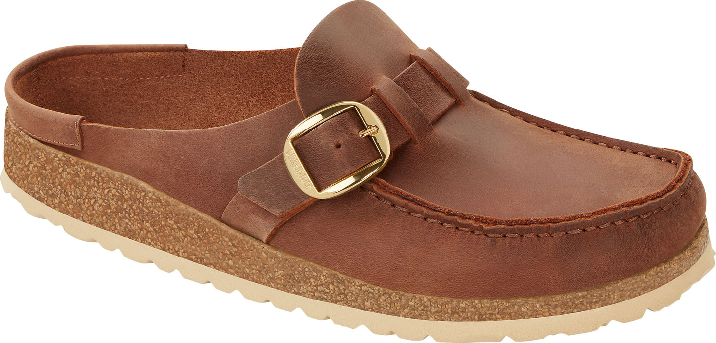 Brown leather clog with gold buckle.