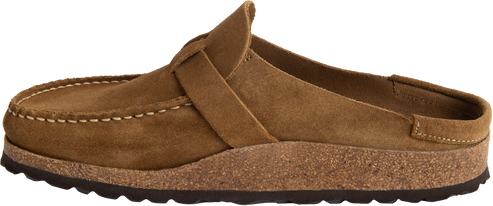 A brown suede clog shoe with a moccasin toe and an open back.