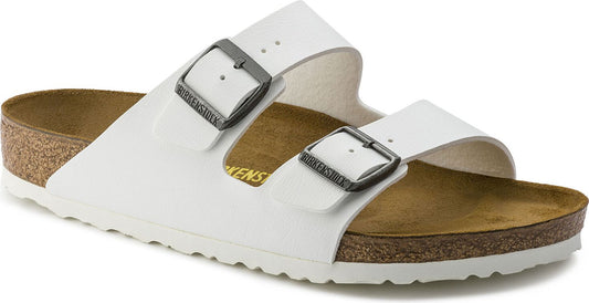 White two-strap sandal with adjustable metal buckles, contoured footbed and flat sole.