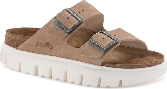 Two strap light brown sandal with silver buckles and a thick white sole. The word "papillio" is on the side.