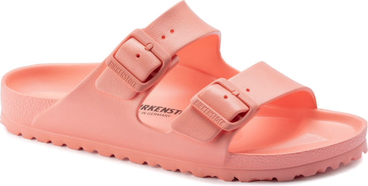 Close-up of matte pink, two-strap adjustable buckle sandal.