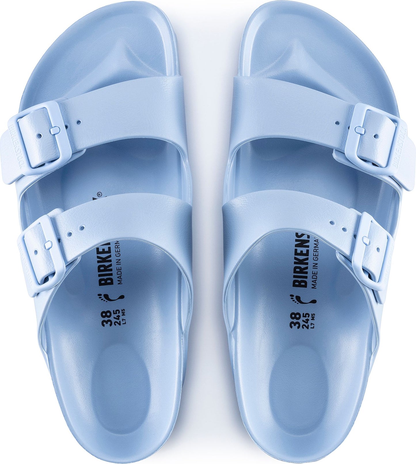 Pair of light blue sandals, top view.