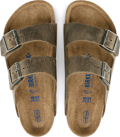 Top-down view of two brown, open-toed sandals with two adjustable buckle straps each. The size is printed on the footbed.