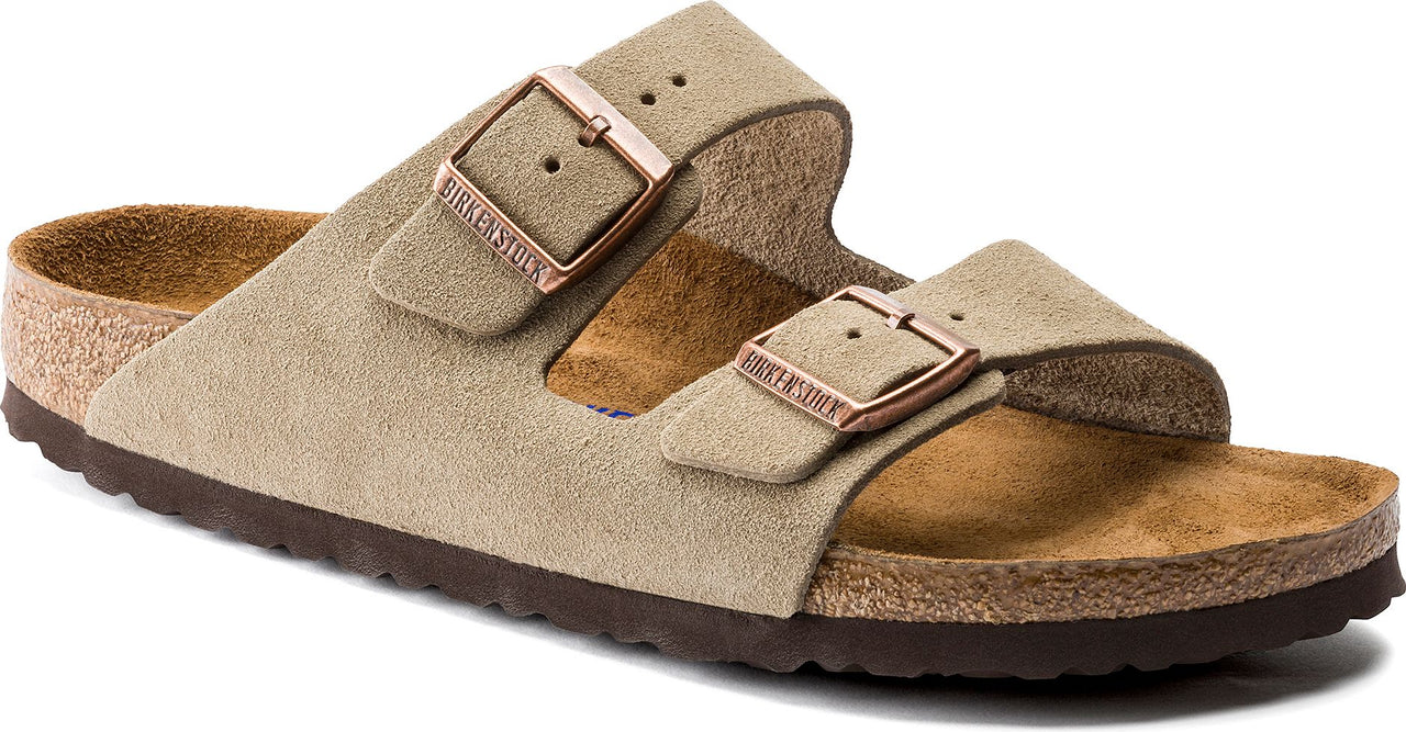 Suede sandal with two adjustable buckled straps and cork footbed.