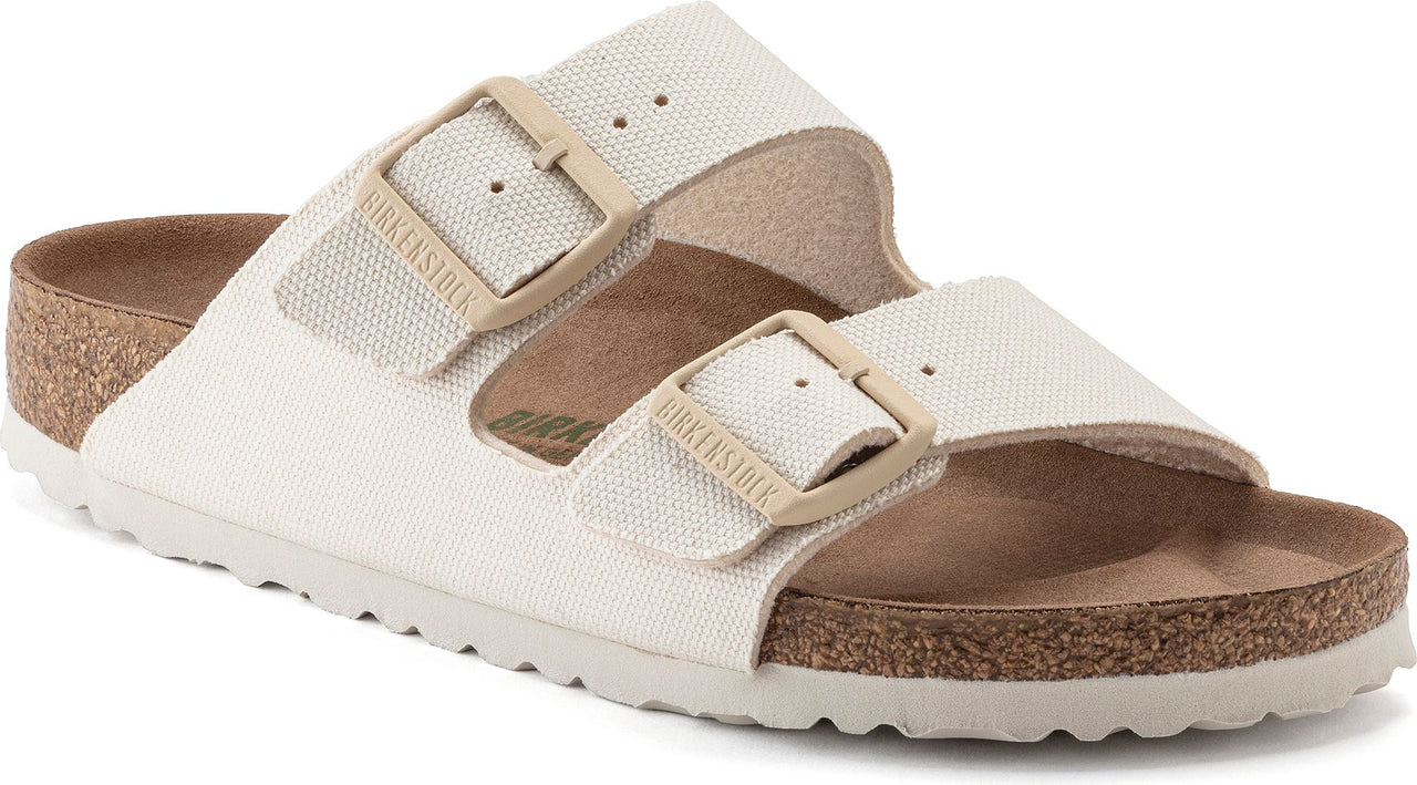 White two-strap sandals with adjustable buckles and cork sole.