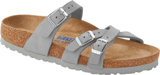 A gray sandal with three straps and buckle closures.