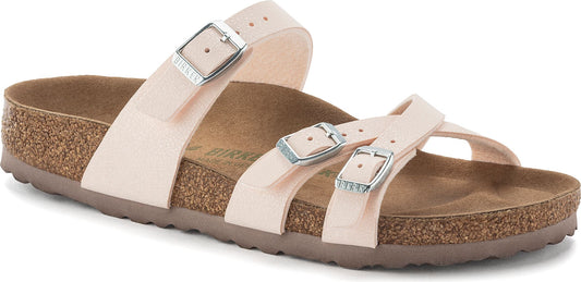 Light pink sandal with silver buckles and three straps.