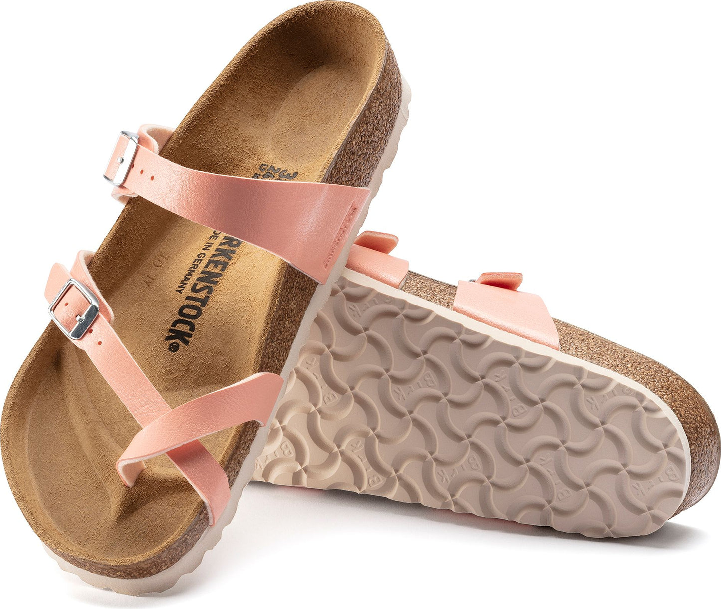 Pair of pink sandals with two adjustable buckle straps and a toe loop.