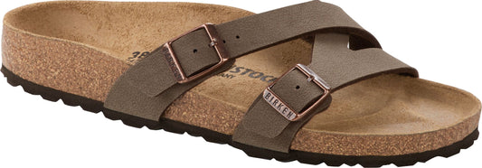 A pair of brown sandals with two straps, each with a buckle, and a cork footbed.