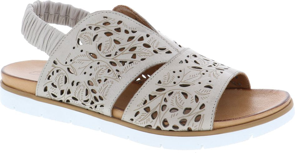 Beige sandal with floral cutouts and elastic heel strap.