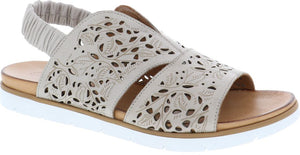 Beige sandal with floral cutouts and elastic heel strap.