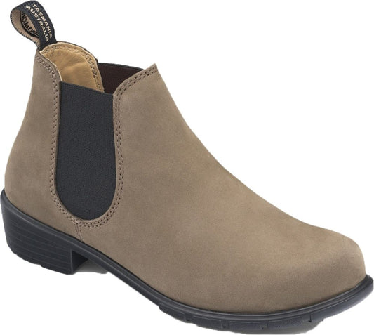 Tan ankle boot with a low heel and elastic sides.