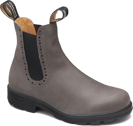 Gray ankle boot with black elastic side panels and black sole.