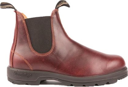Ankle-high, burgundy leather Chelsea boot with black elastic side panels and a dark lug sole.
