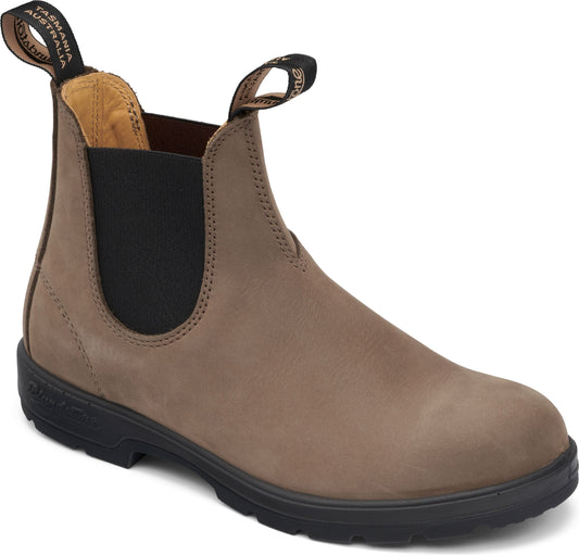 A brown leather Chelsea boot with black elastic side panels, pull tabs, and lugged outsole.