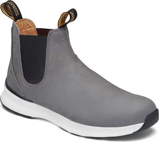 Gray ankle boot with black elastic sides and white sole.